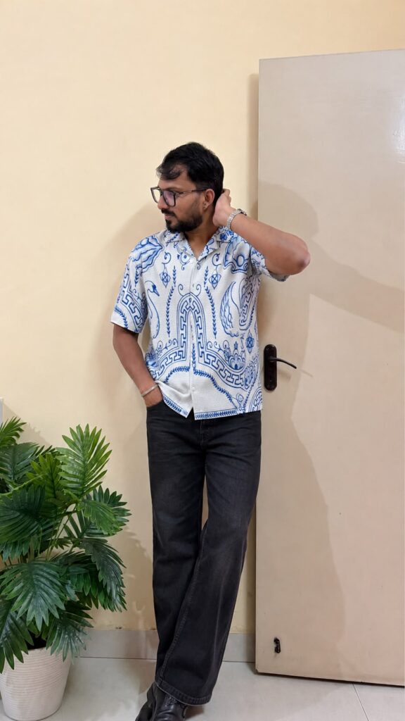 White Ethnic Motifs Printed Opaque Casual shirts ,has a Spread Collar, Button Placket, Short Regular Sleeves, Curved hem