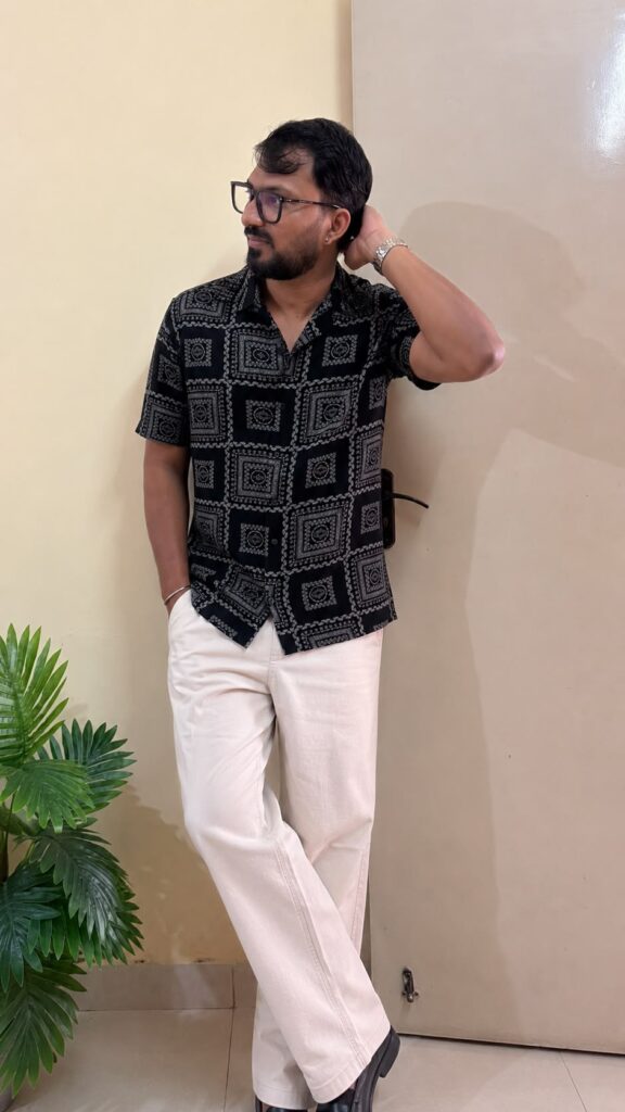 Geometric printed opaque Casual shirt ,has a spread collar, button placket, short regular sleeves, curved hem.