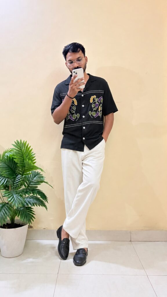 Black floral printed opaque Casual shirt ,has a cuban collar, button placket, na pocket, short drop-shoulder sleeves, straight hem