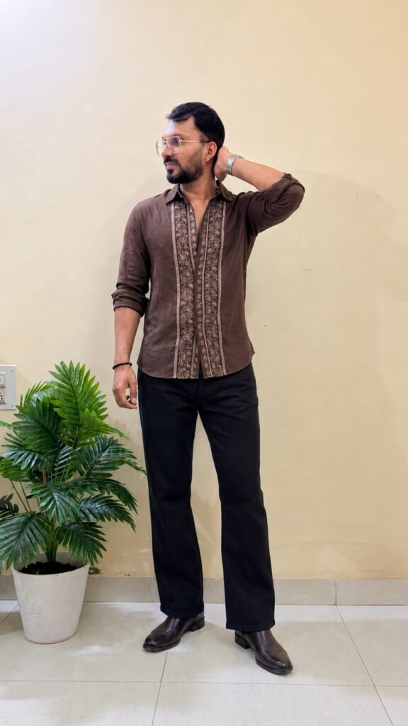 Brown solid printed opaque Casual shirt ,has a spread collar, button placket, na pocket, long regular sleeves, straight hem.