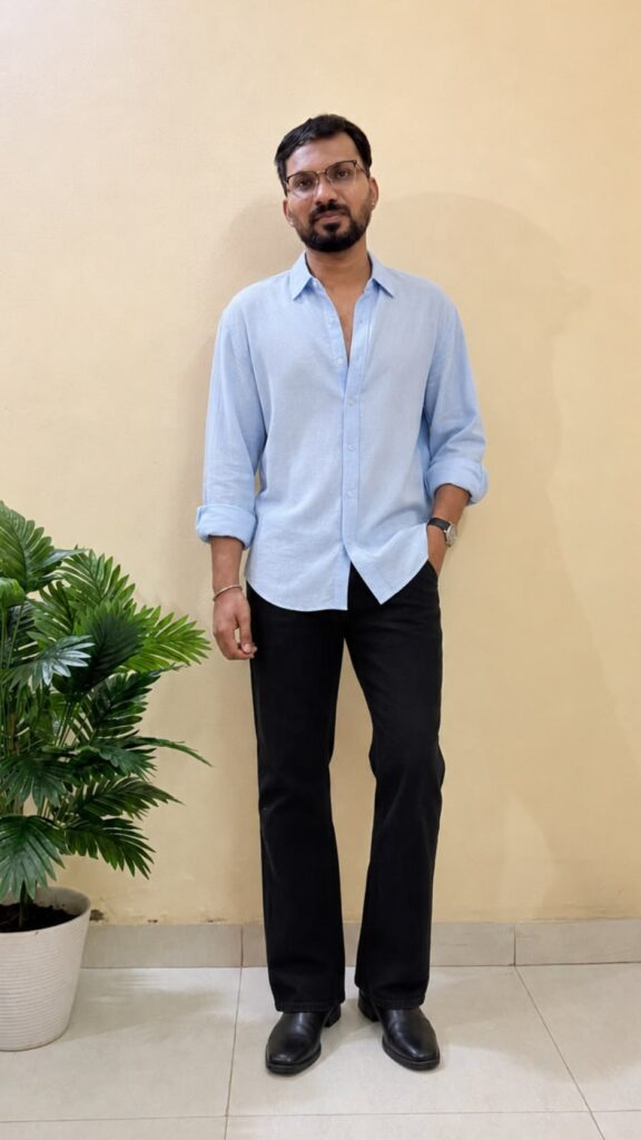 Blue textured opaque Casual shirt ,has a cutaway collar, button placket, na pocket, long regular sleeves, straight hem