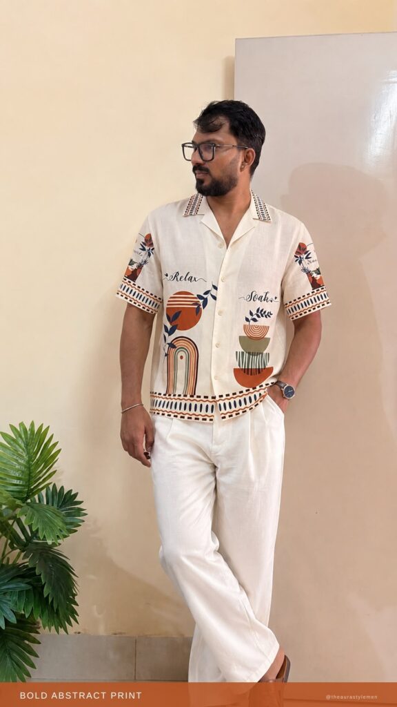 Man wearing an all-over printed casual shirt in a standing pose