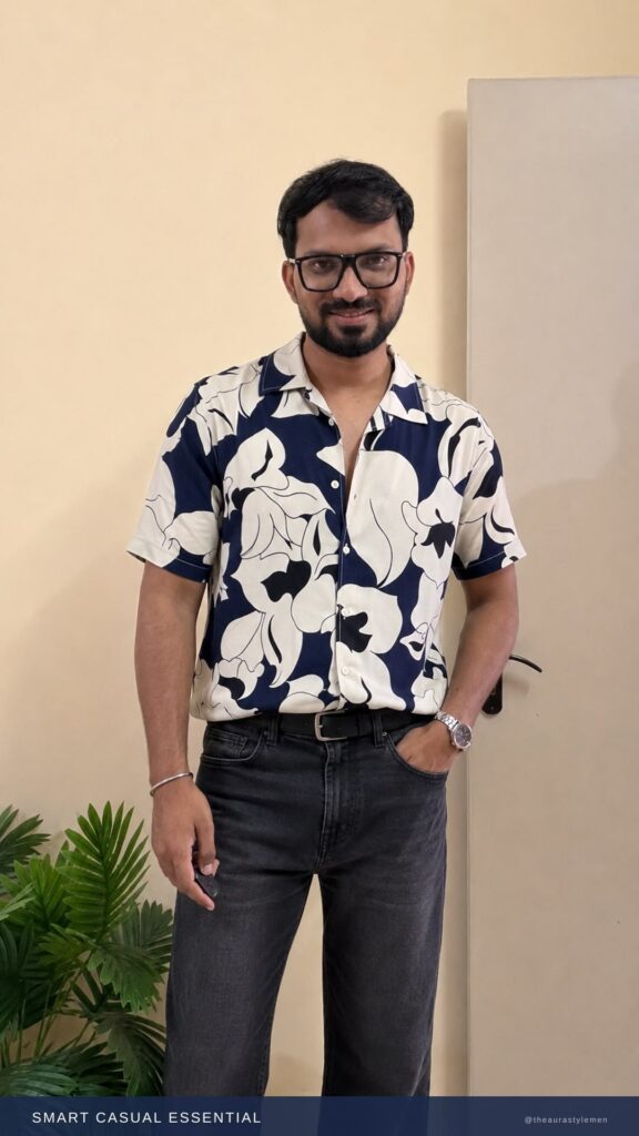 Man wearing a navy blue slim fit printed shirt in a smart casual outfit