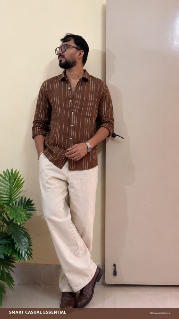 Brown striped shirt with cream trousers for a smart office casual men’s look