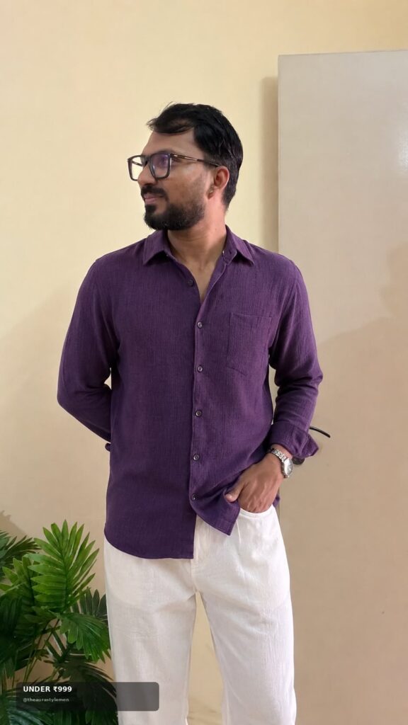 Purple solid men’s shirt styled with white trousers for budget fashion