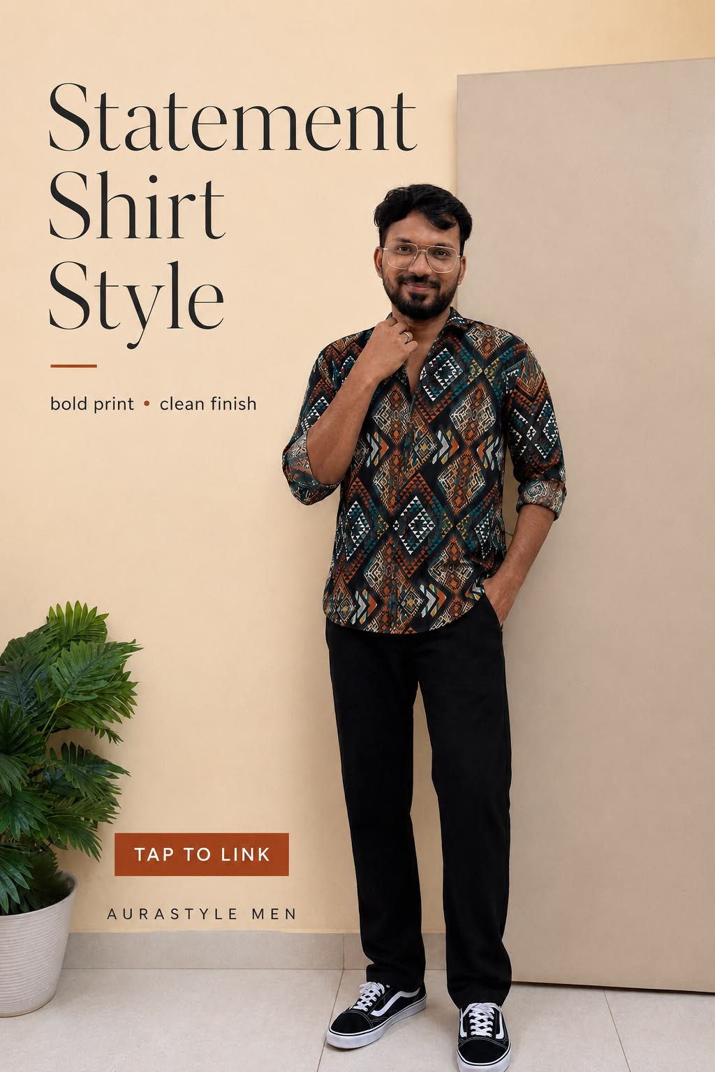 Men’s smart-casual outfit featuring a multicolour geometric printed shirt, black trousers and black-and-white sneakers.