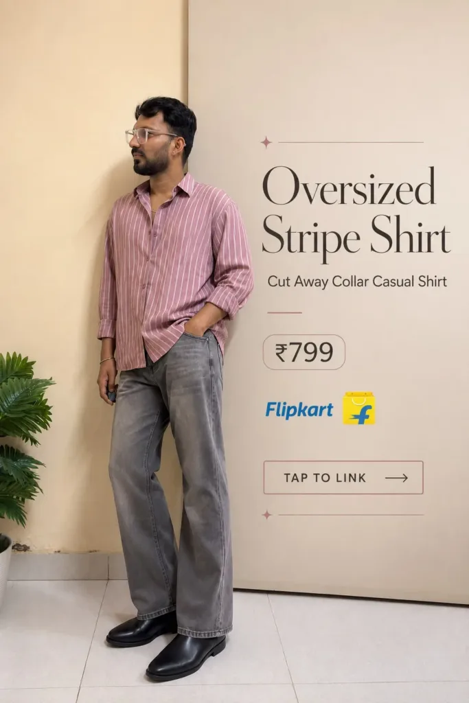 Man wearing a pink and white striped oversized cut-away collar shirt with grey wide-leg jeans and black shoes. — Oversized Striped Shirt Outfit