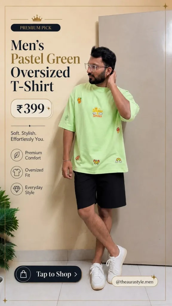 Man wearing a pastel green oversized T-shirt with black shorts and white sneakers, styled as a premium Pinterest shopping pin for men’s casual