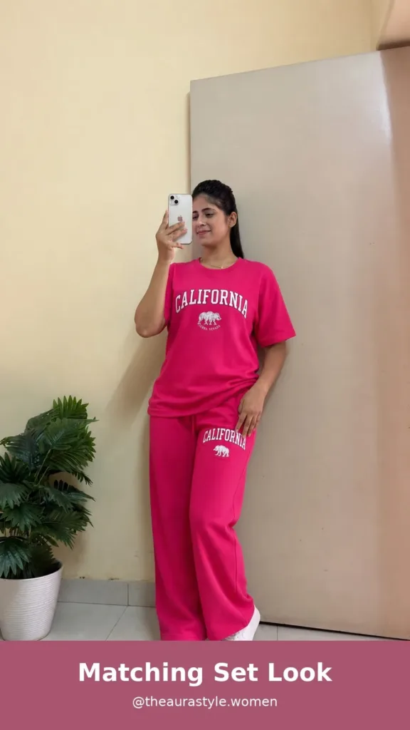 Woman wearing a bright pink graphic T-shirt and wide-leg pants co-ord set. — Pink Premium Co-ord Set Outfit for Women