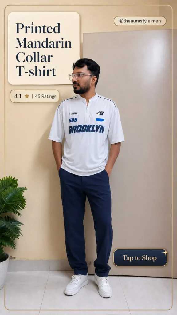 Man wearing a white printed mandarin collar T-shirt with navy pants and white sneakers, styled in a clean smart casual men’s outfit with Tap to