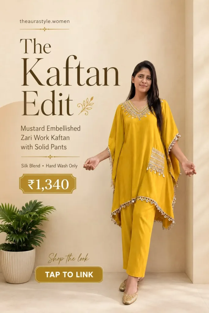 Woman wearing a mustard yellow embellished zari work kaftan with matching solid pants and traditional footwear in a minimal beige editorial