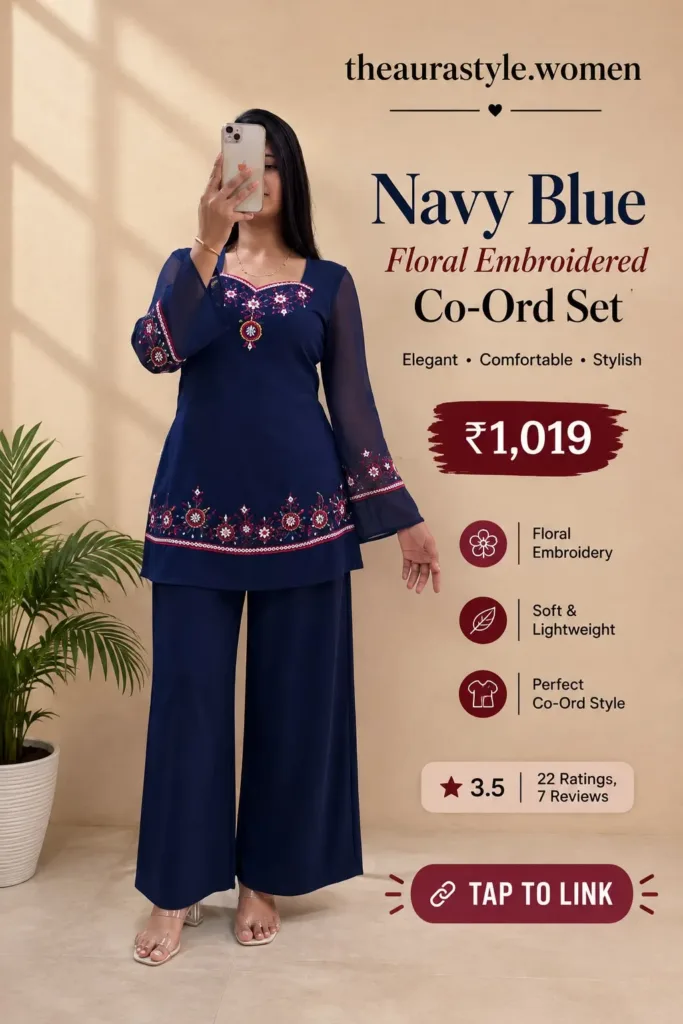 Woman wearing a navy blue floral embroidered top with matching wide-leg pants, styled as a coordinated fashion set. — Navy Blue Co-ord Set Outfit