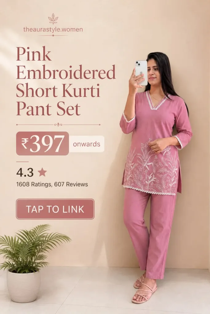 Woman wearing a pink embroidered short kurti pant set with matching pants and sandals, shown in a minimal Pinterest fashion ad with price ₹397