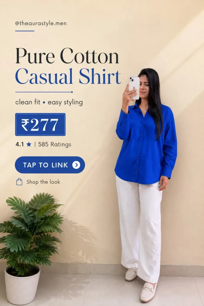 Woman wearing a royal-blue pure cotton button-down casual shirt with white wide-leg trousers and beige loafers, styled as a minimal